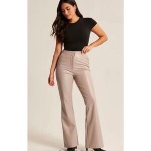 Abercrombie & Fitch Vegan Leather Slim Flare Pants in a Tan/Taupe Color